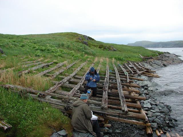 Testing the beach around a boat slipway.